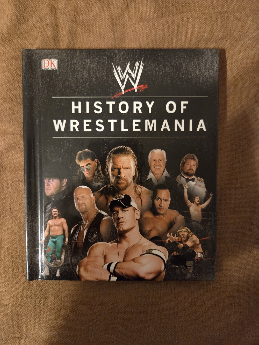 WWE History of WrestleMania Hardcover Book